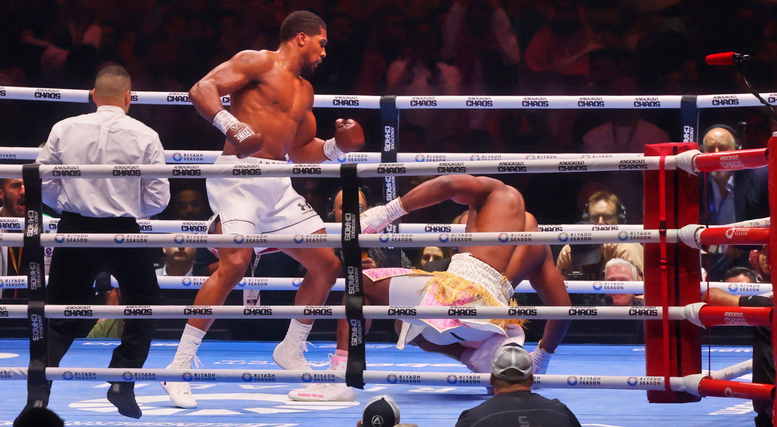 Witness the electrifying clash between heavyweight boxing champion Anthony Joshua and MMA powerhouse Francis Ngannou in Riyadh. Experience the explosive knockout victory and the crossroads in Ngannou's combat sports career. Dive into the celebration of combat sports that captivated fans worldwide.